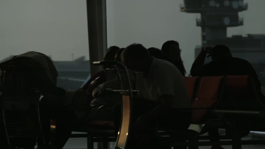 A crowd of people inside an airport
