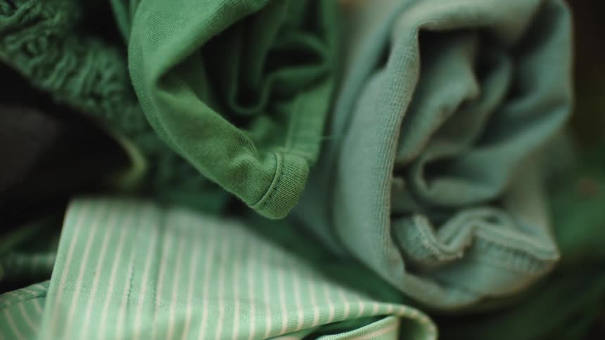 A pile of clothes laying on top of each other