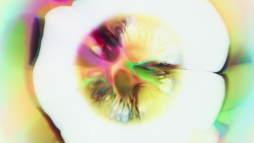 Liquid under a microscope exploding outwards