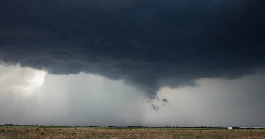 Time lapse of a super cell storm as it builds and then dumps an incredible amount of rain and hail before overwhelming the camera in darkness