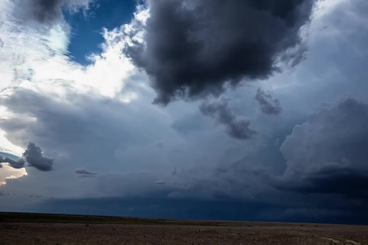 Super wide time lapse of a massive severe weather anvil cloud forming high above New Mexico in this tornado storm event