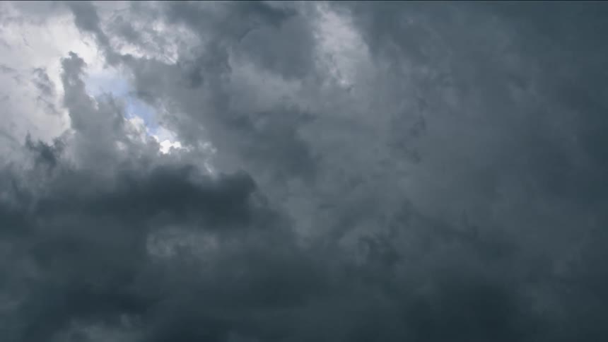 Time lapse shot of an impossible perspective of storm clouds rotating in a super cell storm that rapidly produced a tornado