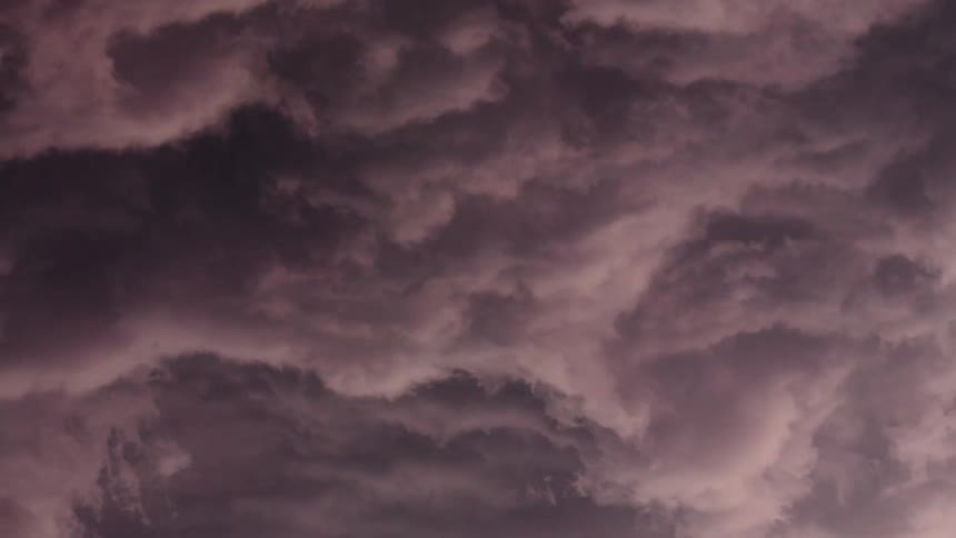 Awesome time lapse looking straight up at severe thunderstorm clouds as they ominously boil and churn resembling ocean waves crashing down on an underwater camera