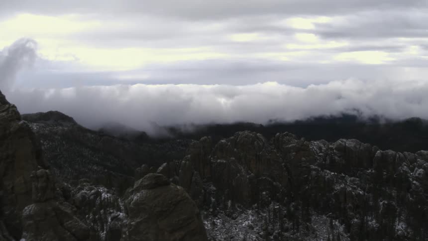 Snow covers part of a mountain range