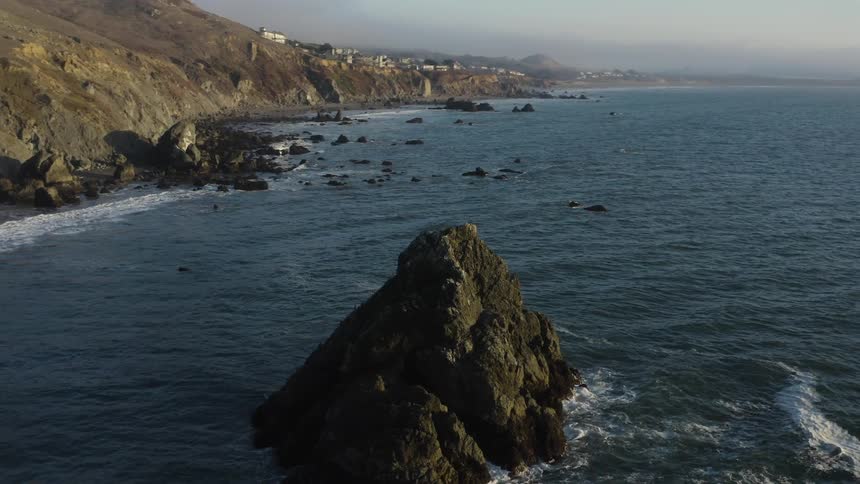 Aerial view of a rocky promontory near the coastal shoreline