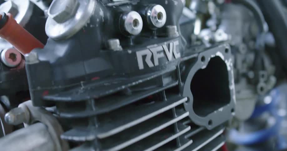 Shaky close up of a disassembled motor engine