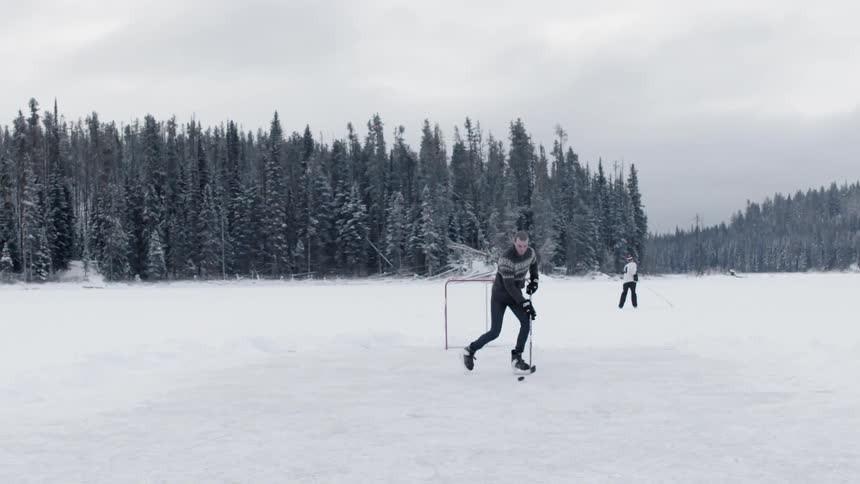 A man is playing hockey