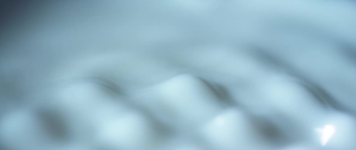 Close up of white bubbling liquid