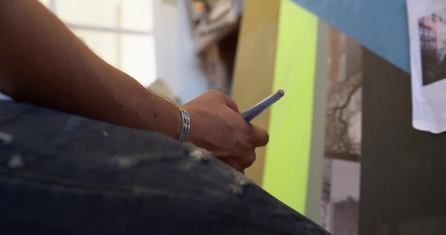 A person sitting and using a phone