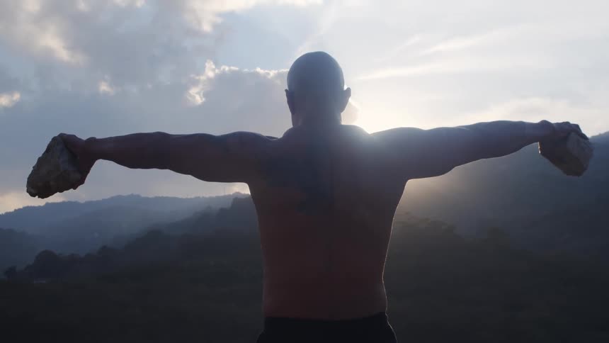 A man working out at dawn