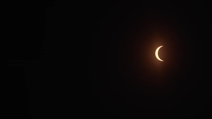 A moon is displayed in the sky at night