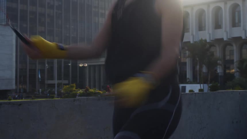 A woman is jumping rope in a suburban area