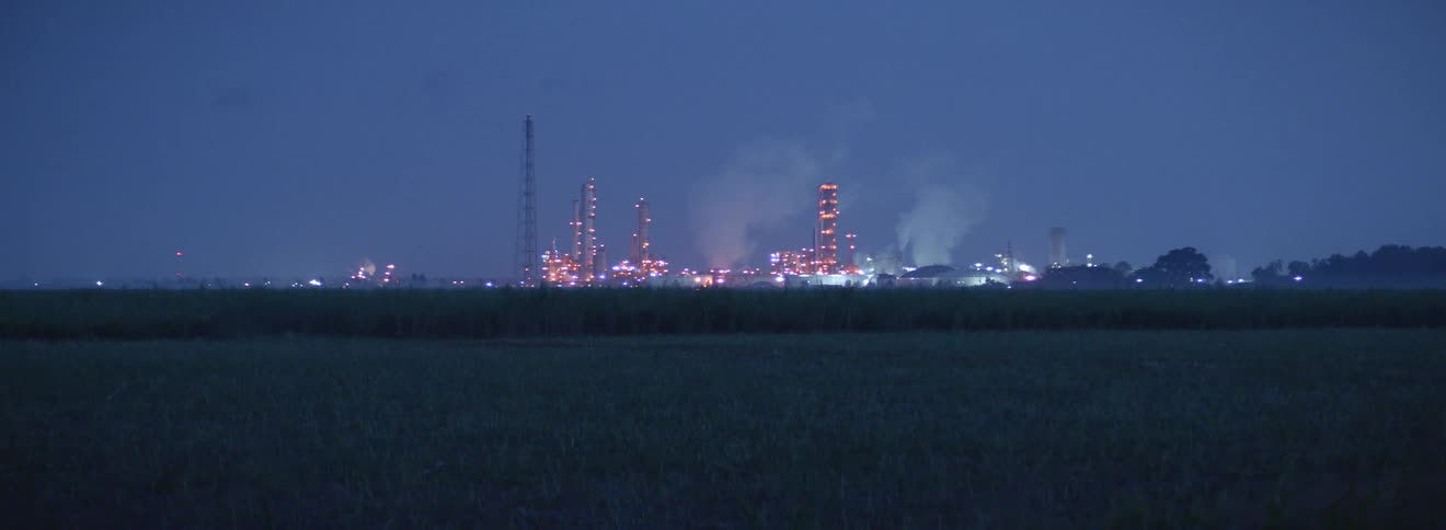 A city skyline is displayed at dusk