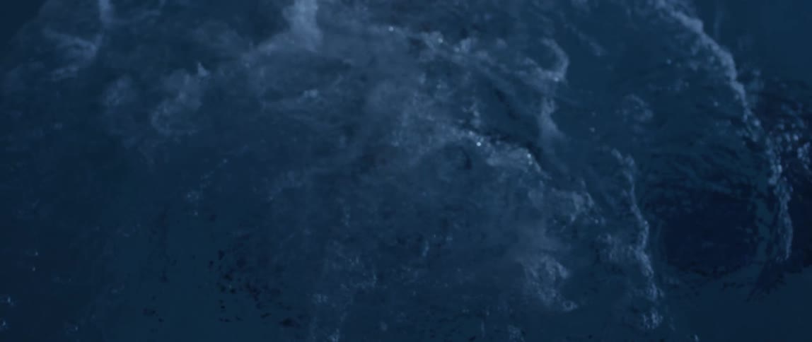 A man is swimming in a pool