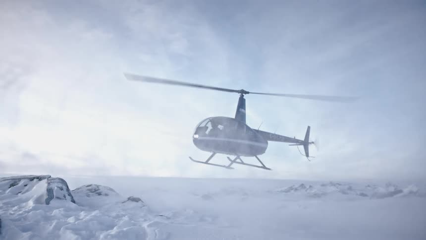 A helicopter is landing in an arctic area