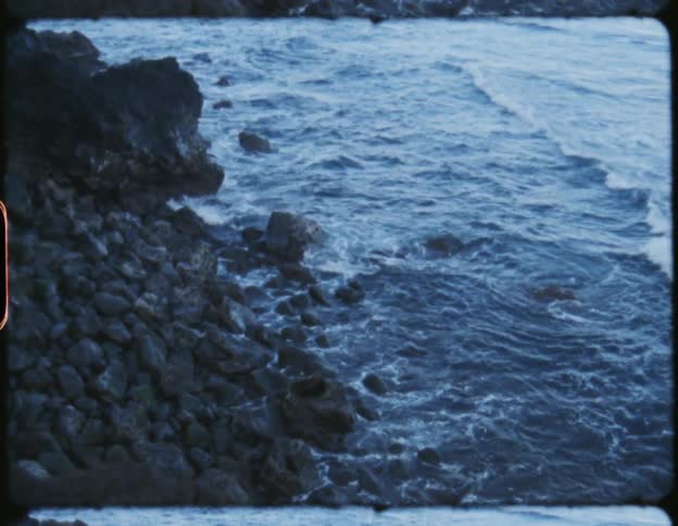 Waves lap the rocky shore