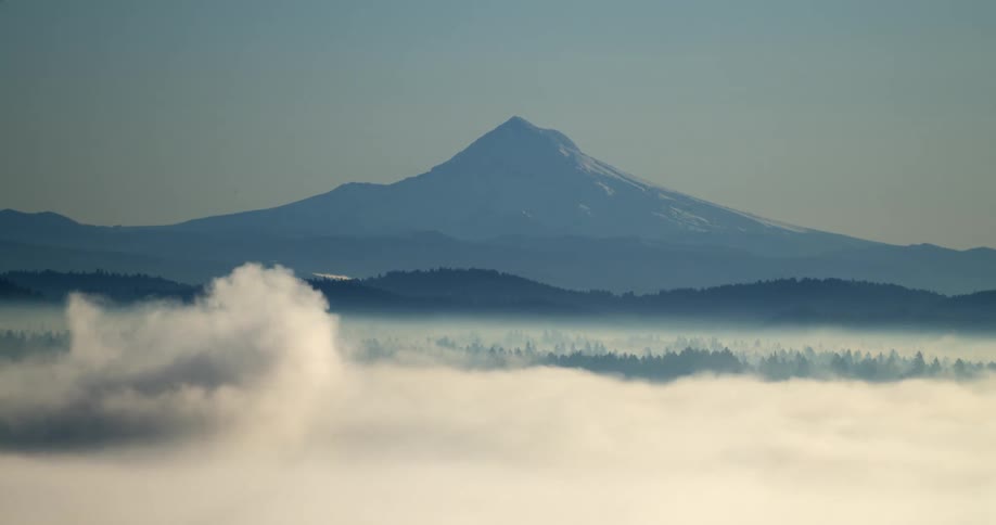 Clouds in front of a mountain range