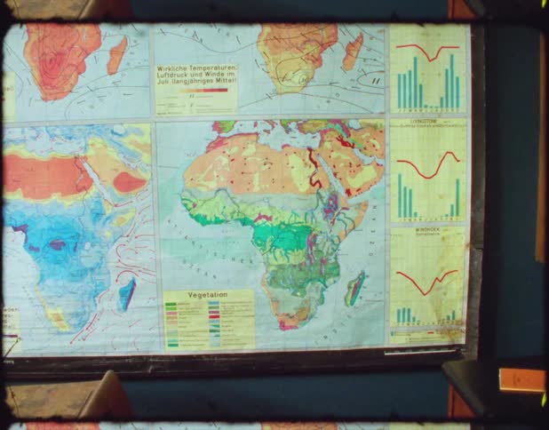 A poster of a map hanging in a classroom