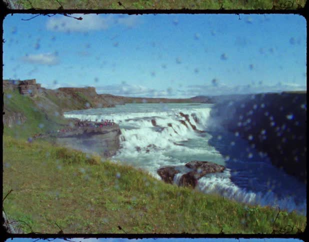 A vintage film of a waterfall flowing