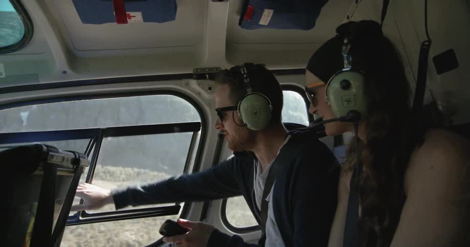 People ride in a small aircraft
