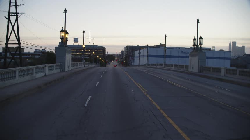 A traffic bridge in a metropolis in the evening