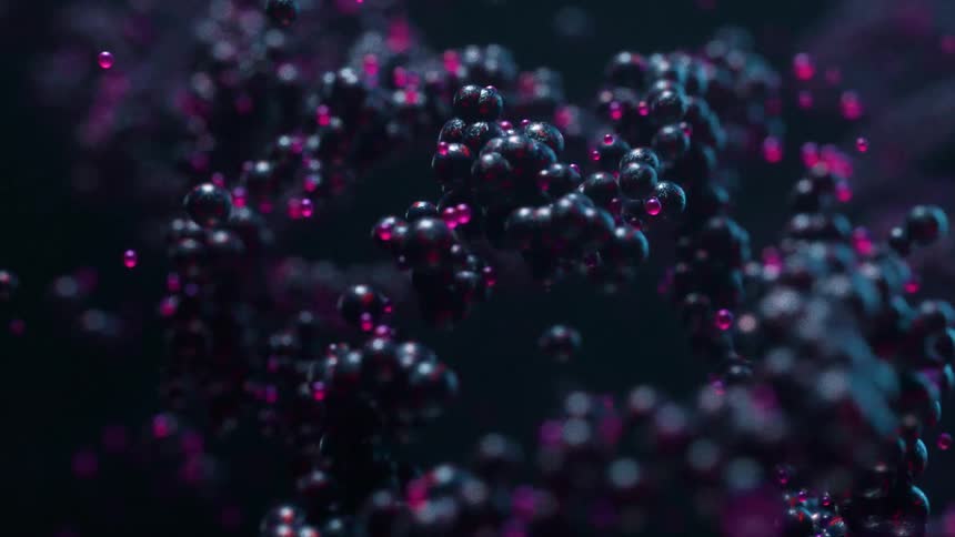 Abstract footage of a biochemical molecule vibrating and floating underwater