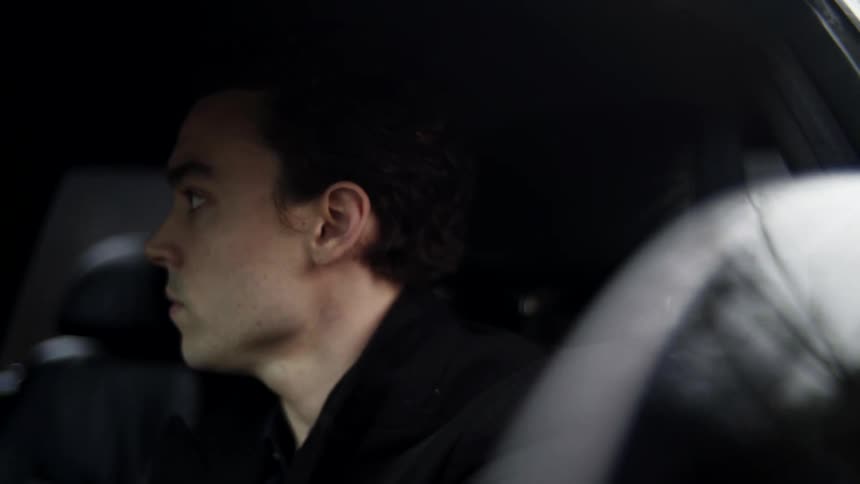A man driving in a car