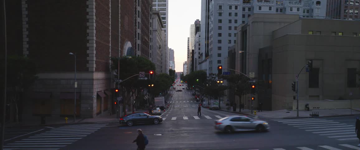 People are walking in a downtown city