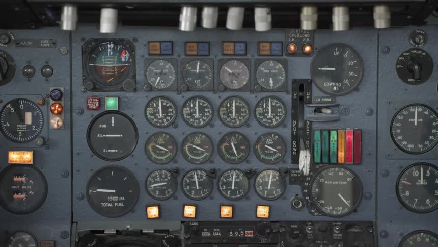 Knobs and dials on the control panel of an aircraft