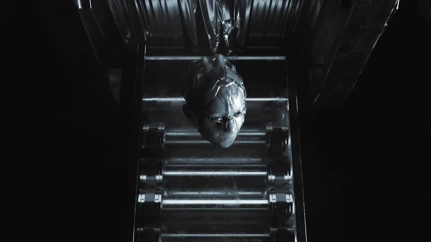Cybernetic robot android heads moving down a conveyor belt
