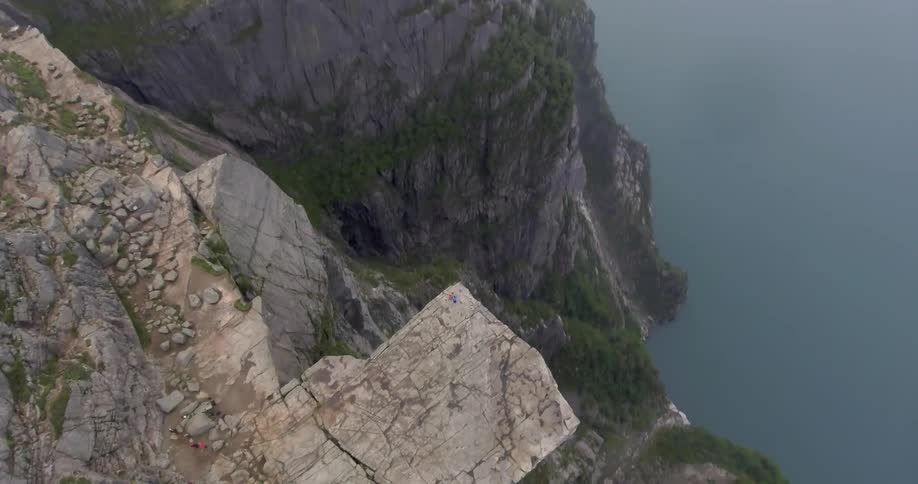 Steep mountain cliffs above a lake