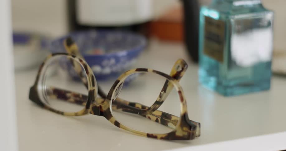 Eyeglasses on a counter in a home