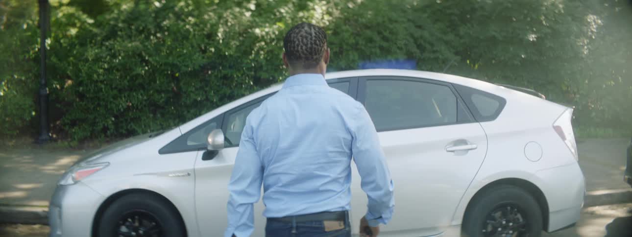 Man walking towards car