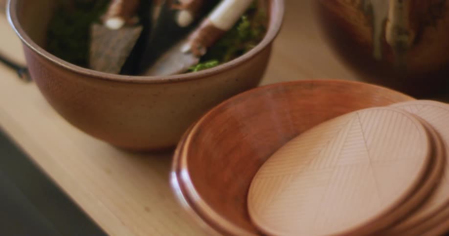 Table with bowls of plants