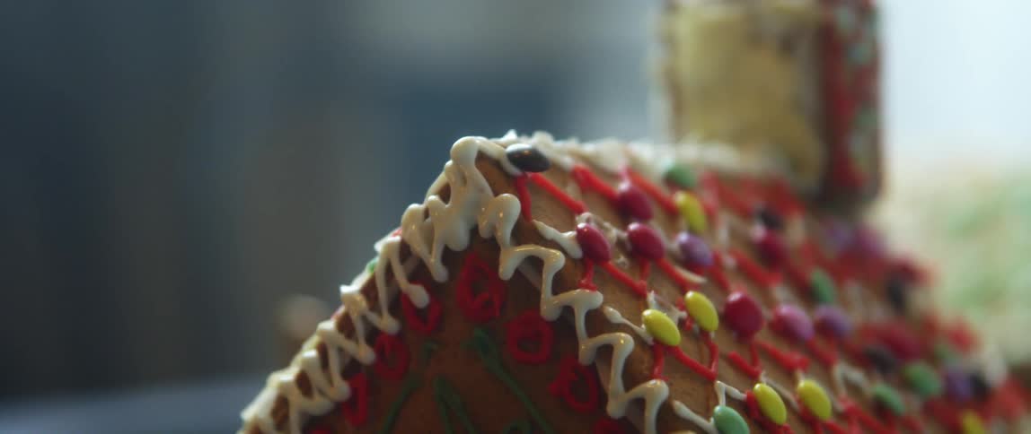 A gingerbread house with candy and frosting