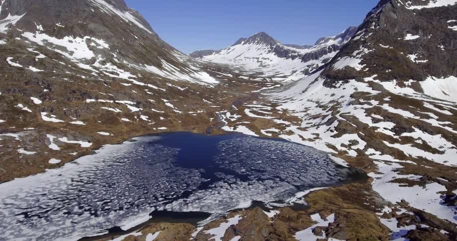 A frozen lake in the mountains