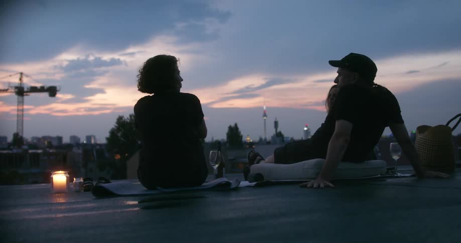 Couple sitting outdoors