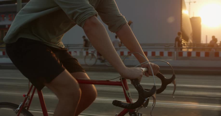 A person is riding a bike in a downtown city