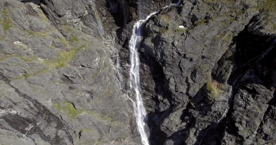 Water cascades down a mountain