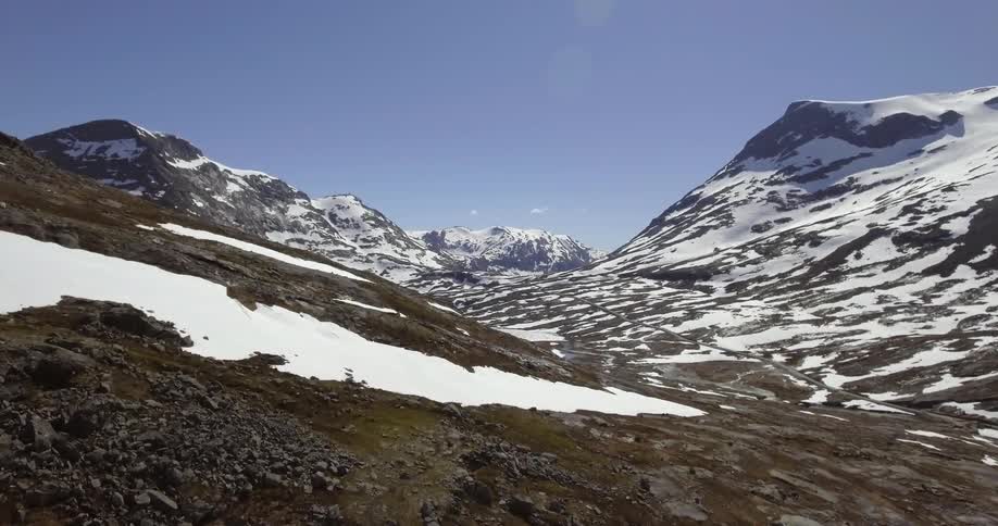Snow covered mountains in the daytime