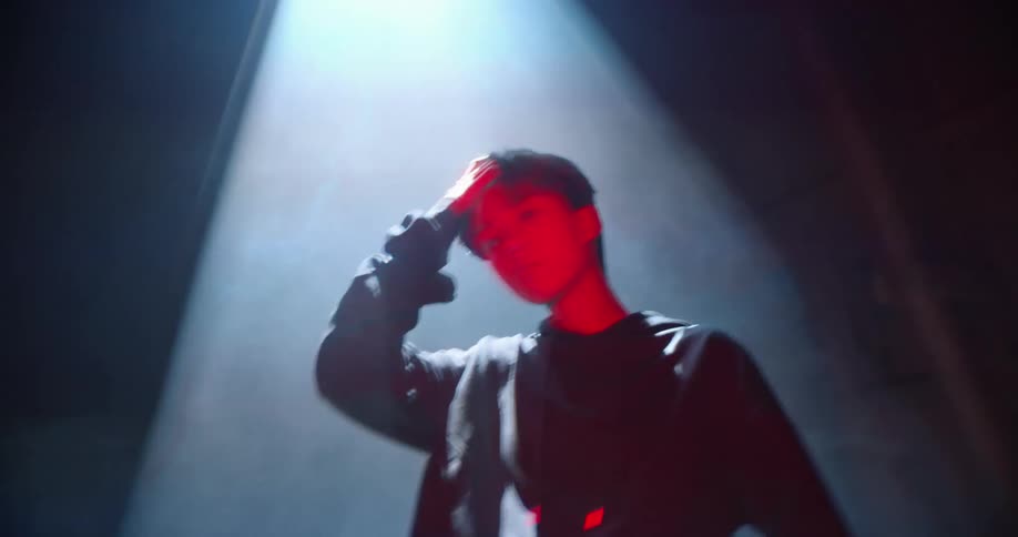 Human posing in a dark room