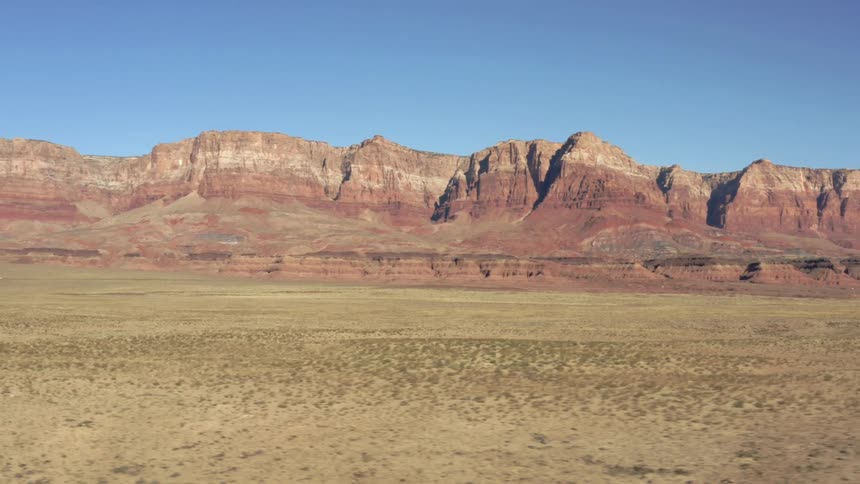 Badlands mesa mountain range on clear day