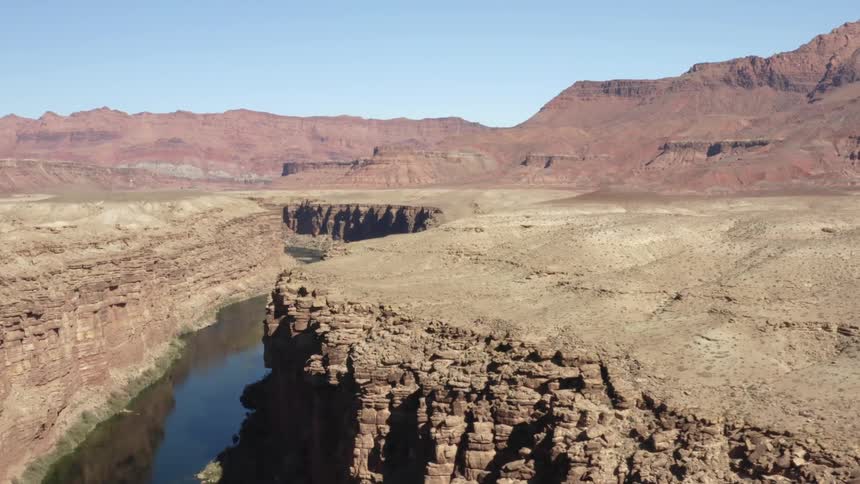 Aerial shot of a river in a canyon