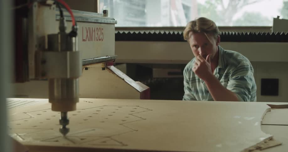 Man watching machine
