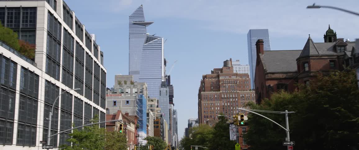 A downtown area with a lot of buildings on a sunny day