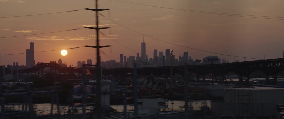 The low evening sun over a metropolis at sunset
