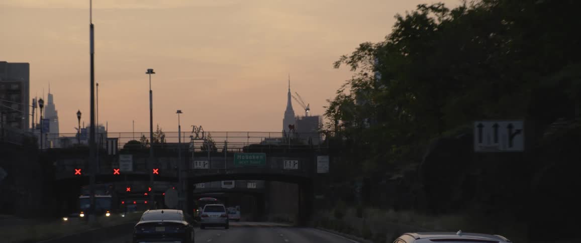 Cars driving on a freeway in a city