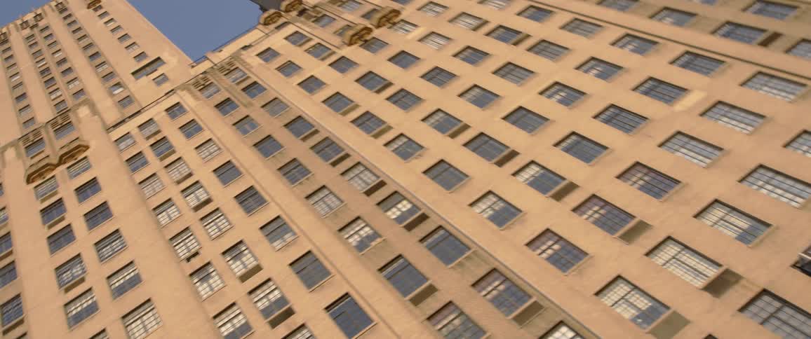 A tall building in a metro area