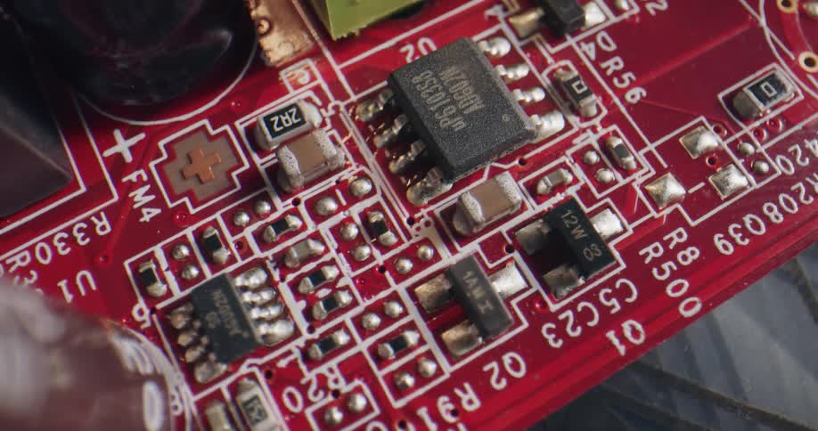 Close up of the components on a red electronic board