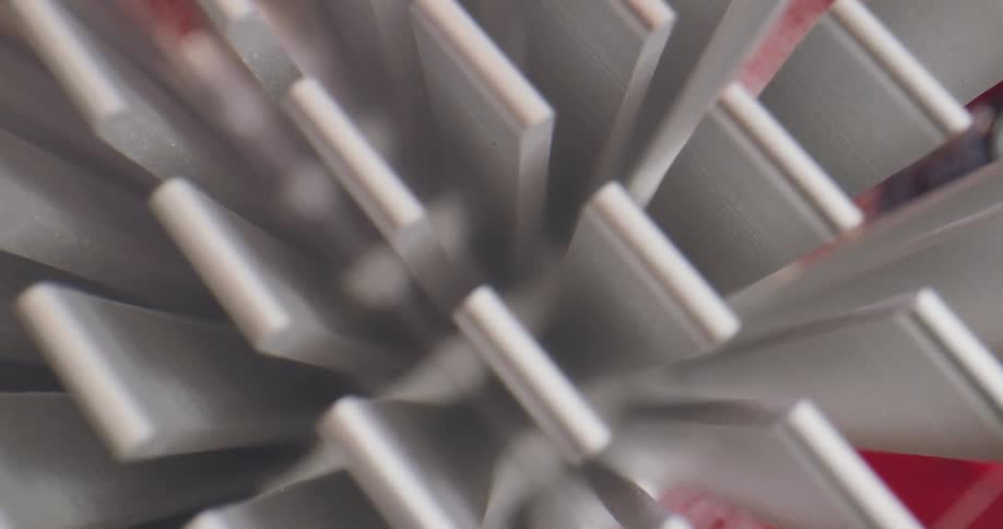 Close up of white rectangular stacks standing up on a white base